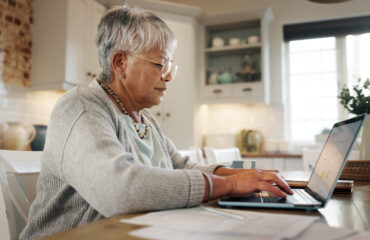 budget-senior-woman-typing-laptop-home-asset-management-pension-funds-application-contract-financial-planning-elderly-person-documents-retirement-wealth-finance-savings