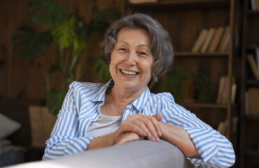 medium-shot-old-woman-library